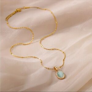 Elegant Gold and Blue Pendant Necklace